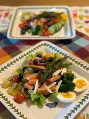 Fresh vegetable salad with a vibrant mix of greens, cherry tomatoes, cucumbers, and bell peppers. Crisp, colorful, and packed with vitamins, this salad makes a healthy, delicious meal or side.
