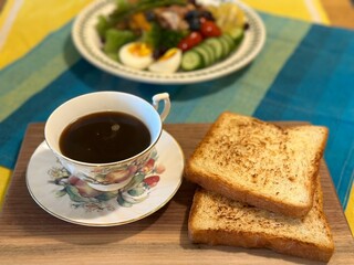 Golden, crispy toast topped with butter and jam, perfect for breakfast or snack-related projects. This image captures the warmth and comfort of a simple yet satisfying meal. Ideal for food designs or 