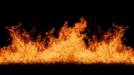 Intense flames rise and flicker dramatically against a deep black backdrop, creating a striking contrast that evokes energy and passion