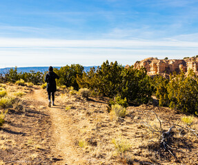 Female Hiker in The Nambe Badlands, Nambe, New Mexico, USA