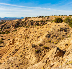 Sandstone Ridgeline and Desert Landscape at The Nambe Badlands, Nambe, New Mexico, USA