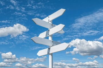 White Directional Signpost Against a Blue Sky with White Clouds