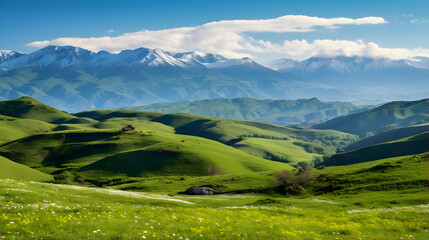 Obraz premium Majestic Azerbaijani Landscape: Panoramic View of Green Hills and Snow-capped Mountains