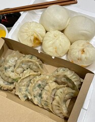 Steamed or fried Korean mandu dumplings filled with a savory mix of meat and vegetables. Crispy on the outside, tender on the inside—perfect for dipping in soy sauce or chili oil!
