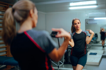 Confident Vain Athletic Woman Pointing to Herself. Narcissistic person being obsessed with her own looks and working out 
