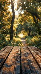 a close up of a wooden table with a path in the background