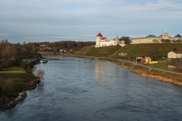Fototapeta premium View of the Grodno Old Castle (Grodno Upper Castle) and the New Royal Palace on the banks of the Neman River on a sunny day, Grodno, Belarus