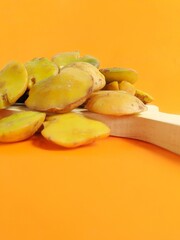 raw ripe jengkol food served on an orange background