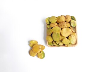 raw ripe jengkol food served on a white background