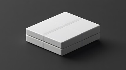 Two white boxes stacked, tied with a thin ribbon, on a dark background.