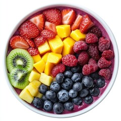 Obraz premium A vibrant fruit bowl featuring strawberries, mangoes, raspberries, blueberries, and kiwi.