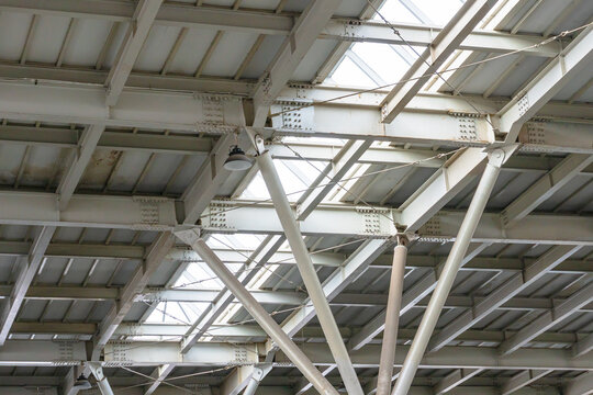 Ceiling with hanging lamps in a Train Station in Jakarta, Indonesia. - Powered by Adobe