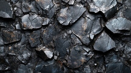 Fototapeta premium Close-up of Dark, Rough, Jagged, and Cracked Rock Surface