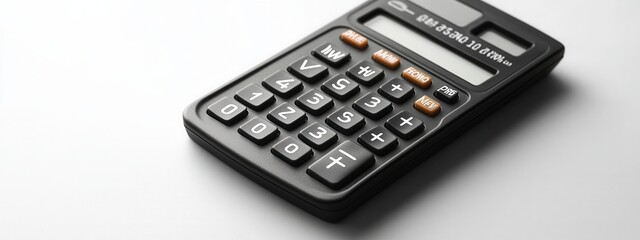 Calculating finances with a simple calculator home office product image minimalist setting close-up view budget management