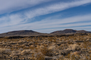 Cinder Cone / Scoria Cone with Lava Flow. Cima volcanic field. Kelbaker Road, Mojave National Preserve. San Bernardino County, California. Mojave Desert / Basin and Range Province. 