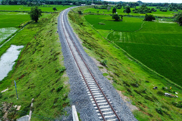 View of railway tracks in rural Indonesia in the afternoon