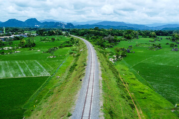 View of railway tracks in rural Indonesia in the afternoon