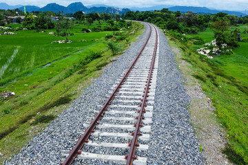 View of railway tracks in rural Indonesia in the afternoon