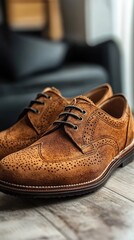 Elegant Brown Leather Brogue Shoes on Wooden Floor - Fashion Footwear Style