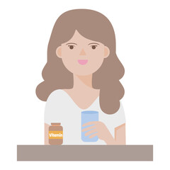 A woman is taking vitamins to nourish her body.