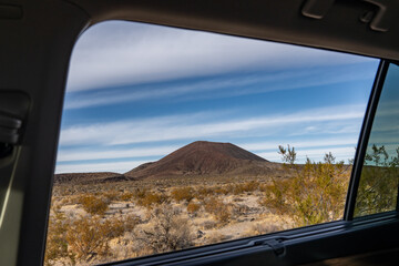 Cinder Cone / Scoria Cone with Lava Flow. Cima volcanic field. Kelbaker Road, Mojave National Preserve. San Bernardino County, California. Mojave Desert / Basin and Range Province. 