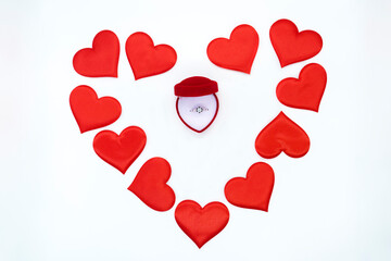 ornament, decoration, picture, symbol of a declaration of love, St. Valentine's day, a frame of red hearts in the shape of a heart and an engagement ring