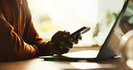 Remote work, research and phone with hands of person in home office for laptop, networking and...