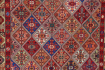Textures and patterns in color from woven carpets. Traditional motifs of Azerbaijani carpet and rug...