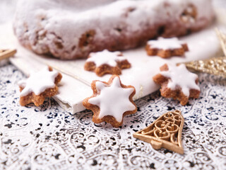 Christmas cookies (cinnamon stars) on bright background. Soft focus. Close up