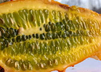photo of a cutaway of Cucumis metuliferus, commonly known as African horned cucumber or kivano