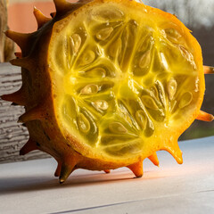 photo of a cutaway of Cucumis metuliferus, commonly known as African horned cucumber or kivano