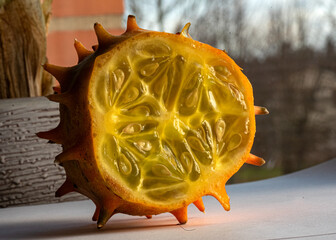 photo of a cutaway of Cucumis metuliferus, commonly known as African horned cucumber or kivano