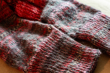 colorful knitted work in progress, handicraft concept, knit texture, wool handicrafts, hobby