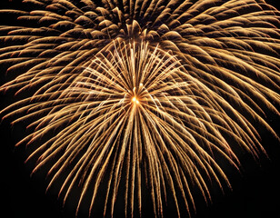 Golden firework fireworks on dark black night sky texture