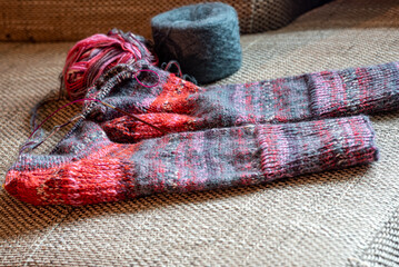 colorful knitted work in progress, handicraft concept, knit texture, wool handicrafts, hobby