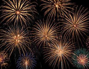 Naklejka premium Golden firework fireworks on dark black night sky texture