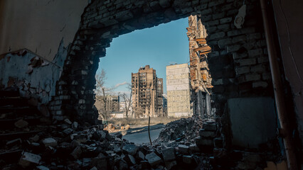 destroyed and burned houses in the city in Ukraine