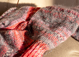 colorful knitted work in progress, handicraft concept, knit texture, wool handicrafts, hobby