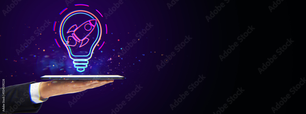 Poster neon glowing rocket inside a lightbulb symbolizing innovation, displayed over a tablet held by a bus