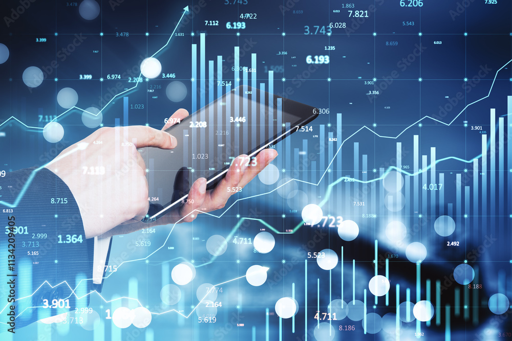Poster Hands using a tablet with digital financial graphs and data on blue background.
