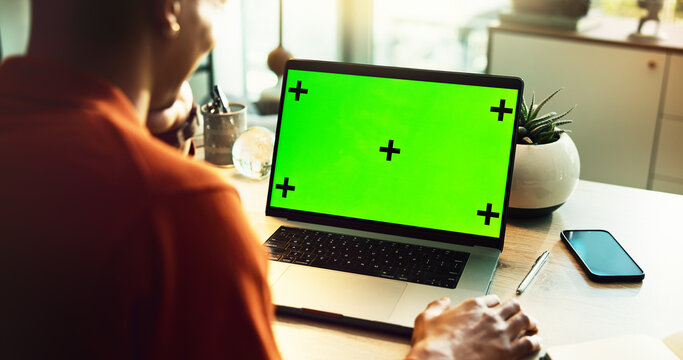 Business person, laptop and green screen with mockup space for online advertising, marketing or UI at home office. Closeup, user or computer with chromakey display or tracking markers for UX or app