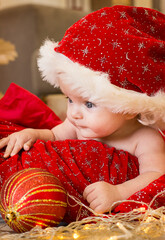 child in santa claus hat