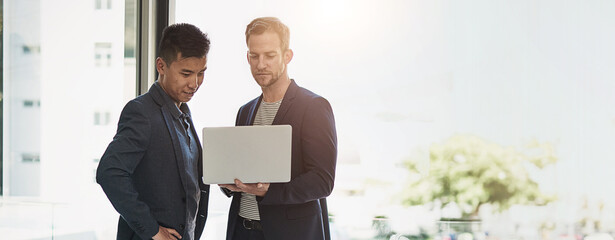 Banner, laptop and business men in office typing for online project, collaboration and meeting. Professional, corporate and people on computer for research, website and planning with mockup space