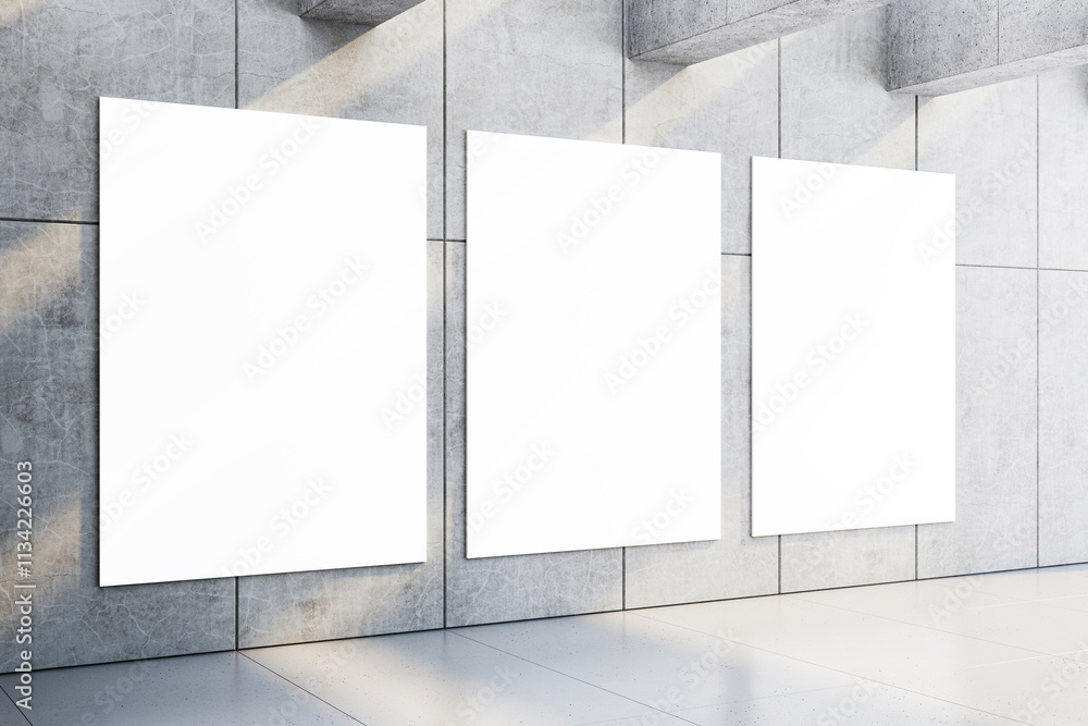 Aufkleber three blank vertical white posters on a grey concrete wall with sunlight and shadows, perfect for mo