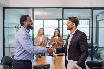 business men doing hands shake for the future business cooperation,multiracial business partnership meeting in the office room