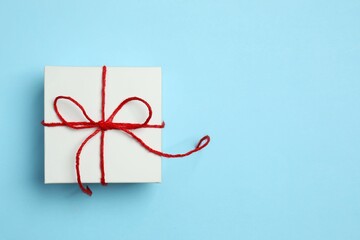 Gift box on color background