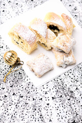 Stollen Bites on bright background. Soft focus. Close up. Copy space.