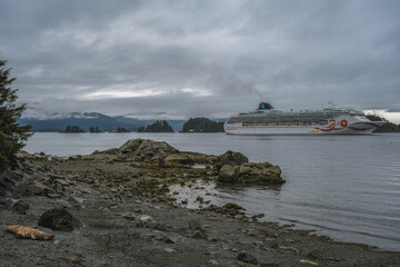 Modern family cruiseship cruise ship liner Sun anchoring in bay of Sitka, Alaska during Last...