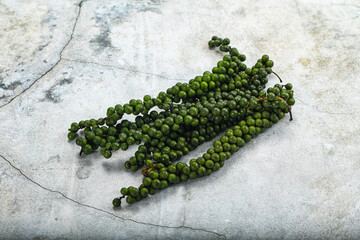 Fresh ripe green peppercon heap