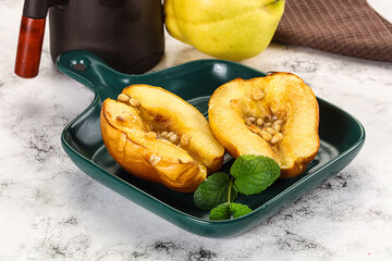 Baked quince with honey and cedar